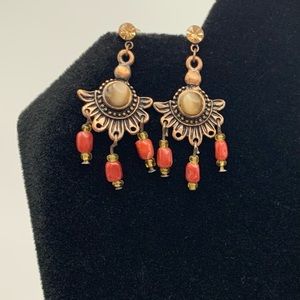 Copper color earrings with red beads. Pre-loved